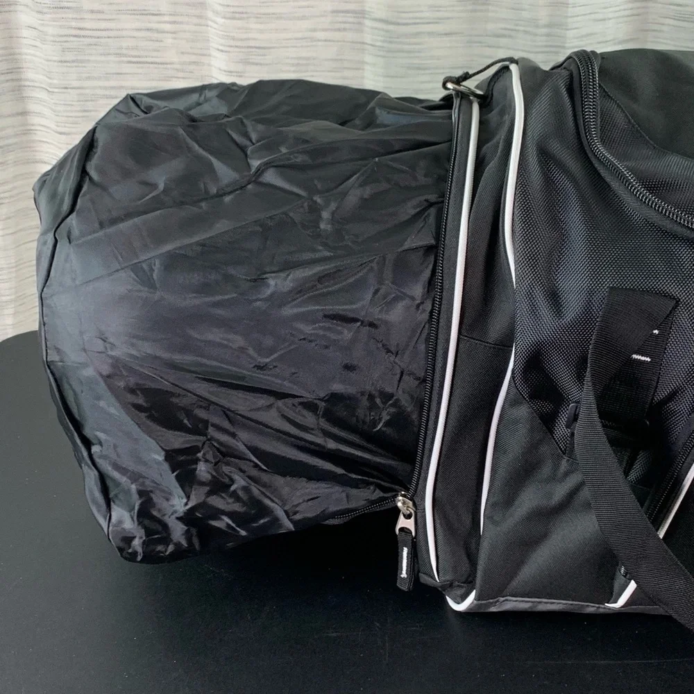 A Black 100th Anniversary Duffel Bag (Masonic?).
